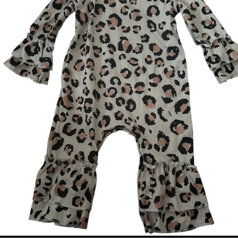 Boutique Clover cottage collection. Leopard Print Ruffle Sleeve Jumpsuit. 0-6mon